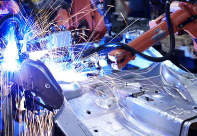 Robots welding a car