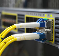 Yellow Fiber Optic Cables Plugged In