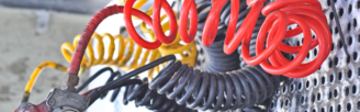 Picture of Red, Yellow and Black Coiled cables